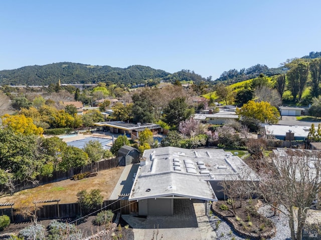birds eye view of property featuring a mountain view