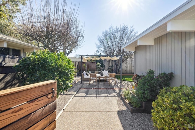 view of patio with fence