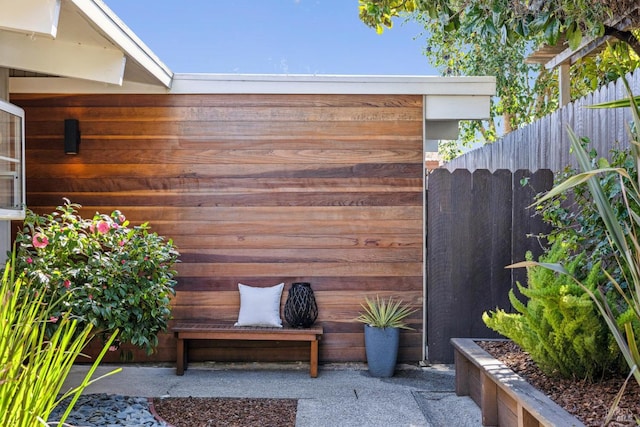 view of patio featuring fence