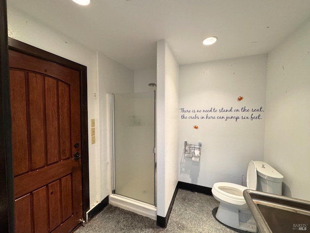 full bath featuring a stall shower, toilet, and baseboards