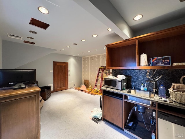 kitchen featuring light carpet, a sink, open shelves, recessed lighting, and appliances with stainless steel finishes