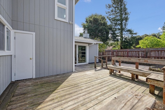 wooden deck featuring fence