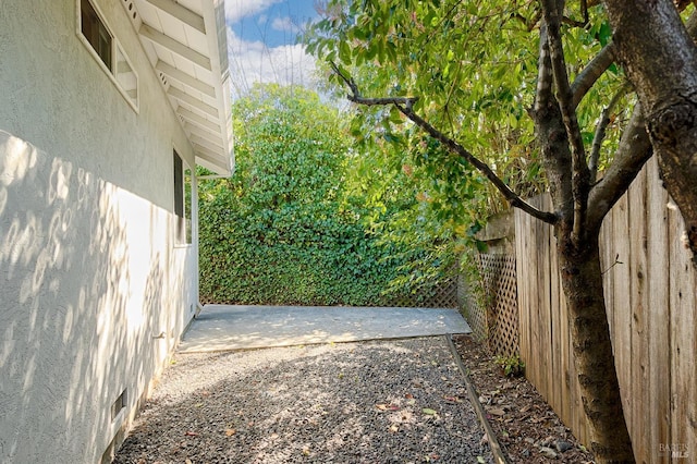 view of gate featuring fence