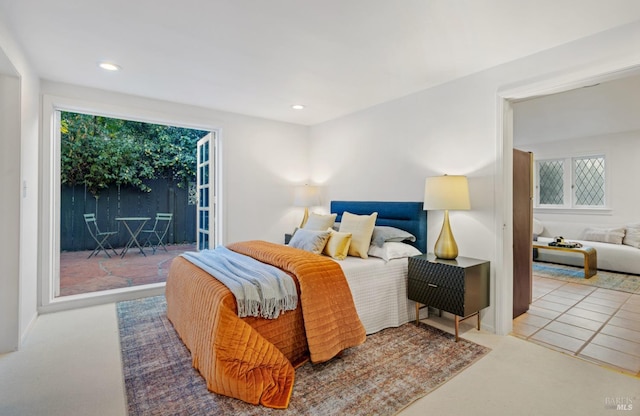 bedroom with carpet, access to exterior, and recessed lighting