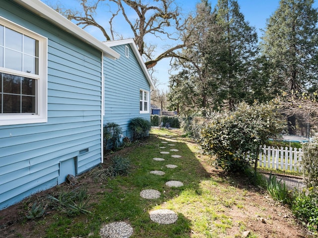 view of yard with fence