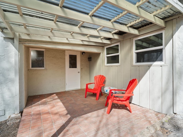 view of patio featuring a pergola