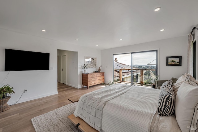 bedroom with recessed lighting, baseboards, access to exterior, and light wood finished floors