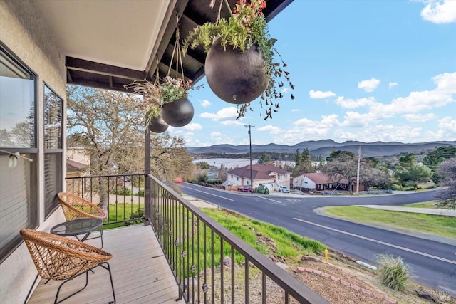 balcony featuring a mountain view