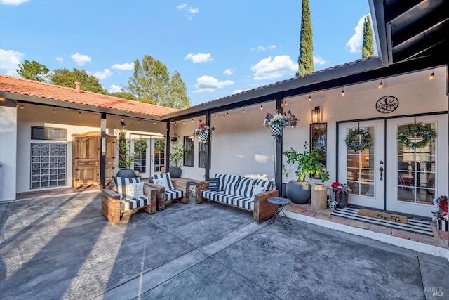 view of patio featuring french doors and outdoor lounge area