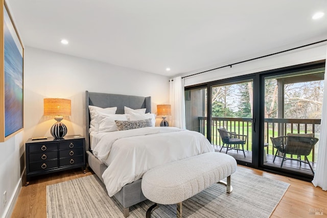 bedroom with recessed lighting, baseboards, light wood-style floors, and access to outside