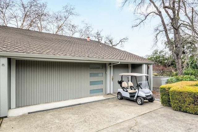 exterior space with a shingled roof