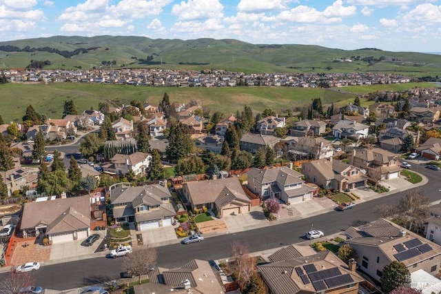 aerial view with a mountain view and a residential view