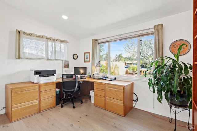 home office with lofted ceiling, recessed lighting, and light wood finished floors