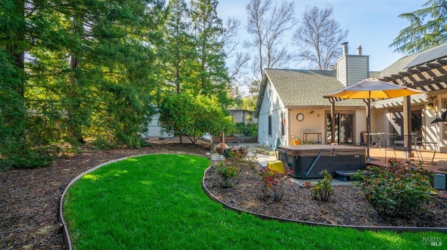 view of yard featuring a patio, a pergola, and a hot tub