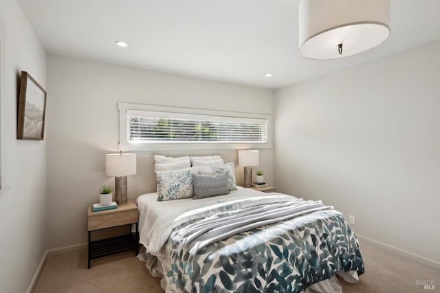 carpeted bedroom featuring recessed lighting and baseboards