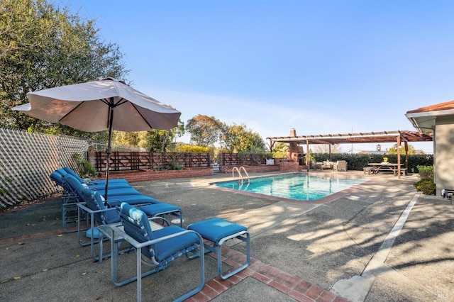 view of pool featuring a patio area, a fenced backyard, a fenced in pool, and a pergola