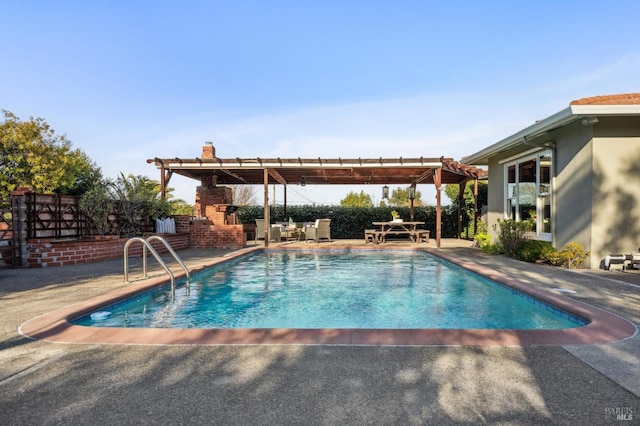 view of swimming pool with a patio area, fence, a fenced in pool, and a pergola