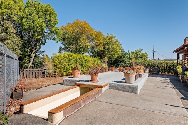 view of patio / terrace with fence