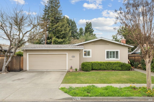 ranch-style home featuring concrete driveway, a front lawn, a garage, and fence