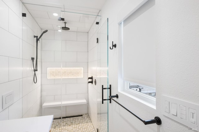 full bathroom with a shower stall