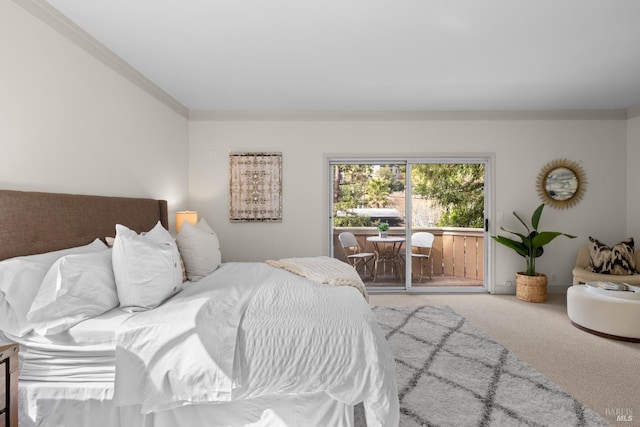 carpeted bedroom with crown molding and access to outside