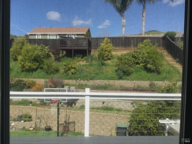 view of yard featuring a balcony
