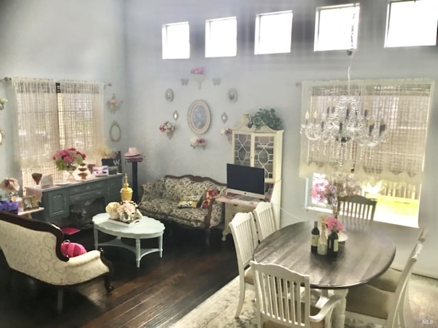dining room featuring an inviting chandelier and wood finished floors