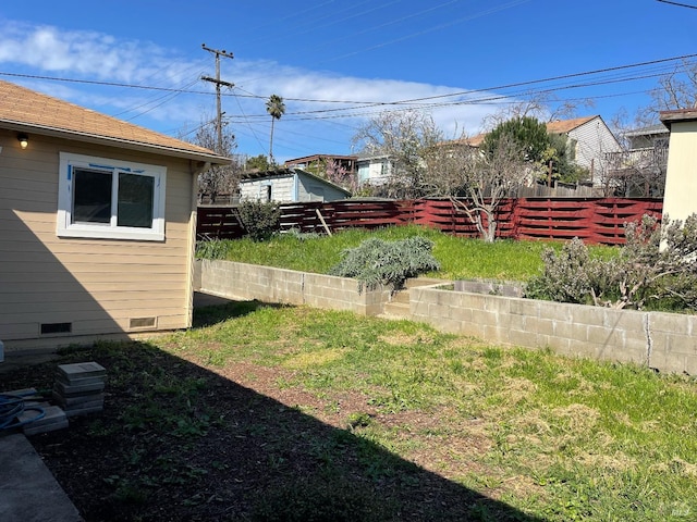 view of yard featuring fence