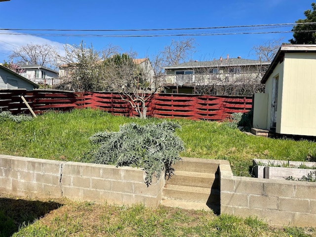 view of yard featuring fence