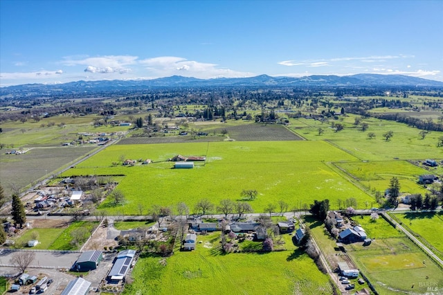 aerial view featuring a mountain view and a rural view