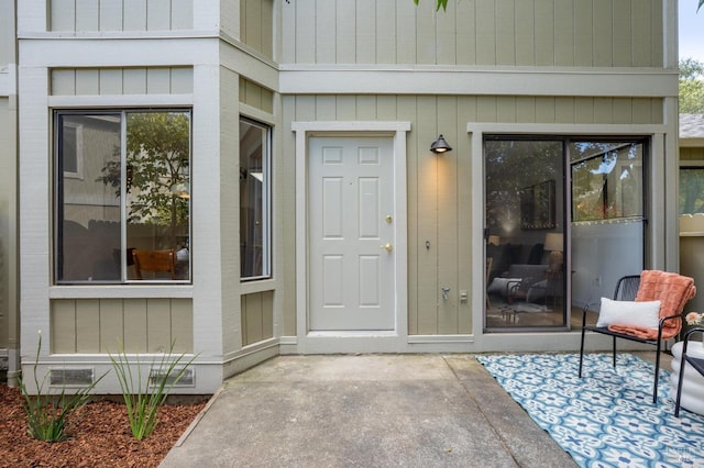 entrance to property with crawl space and visible vents