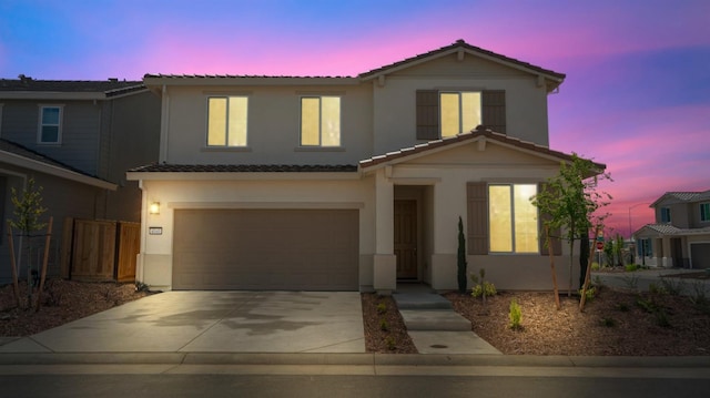 4040 Molten Creek Way, Roseville, CA 95747 - view of front facade featuring a tiled roof, an attached garage, driveway, and stucco siding