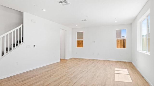 4040 Molten Creek Way, Roseville, CA 95747 - unfurnished living room featuring light wood-type flooring, baseboards, and recessed lighting