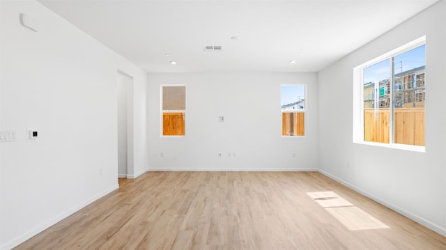 4040 Molten Creek Way, Roseville, CA 95747 - spare room with healthy amount of natural light, light wood-type flooring, and recessed lighting