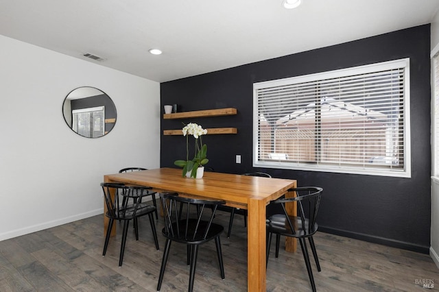 dining room featuring recessed lighting, visible vents, baseboards, and wood finished floors