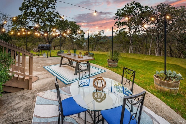 1081 Steele Canyon Rd, Napa, CA 94558 - patio terrace at dusk featuring outdoor dining space and a yard