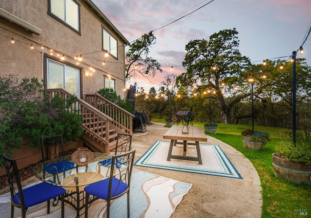 view of swimming pool featuring outdoor dining space, a lawn, a grill, and a patio