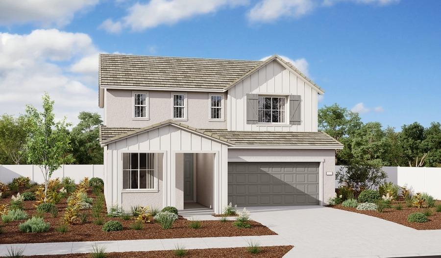 modern farmhouse style home featuring board and batten siding, concrete driveway, and fence