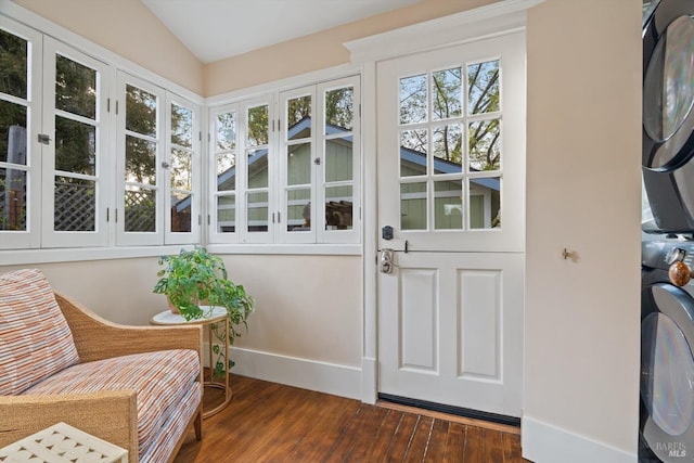 1133 Eggleston St, Napa, CA 94559 - interior space with stacked washer and dryer, vaulted ceiling, and dark wood-style flooring