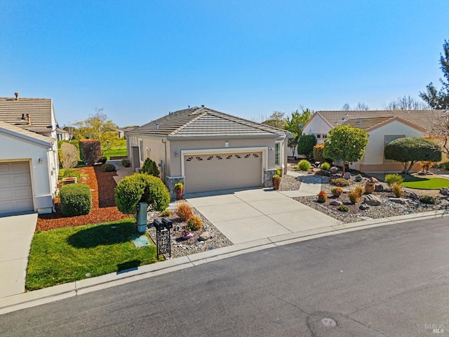 single story home featuring a tile roof, a garage, driveway, and stucco siding