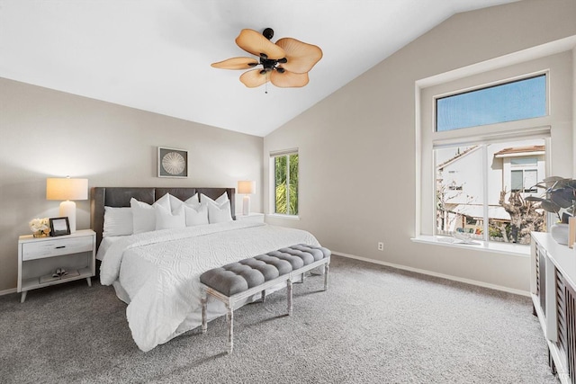 bedroom featuring vaulted ceiling, carpet, baseboards, and ceiling fan