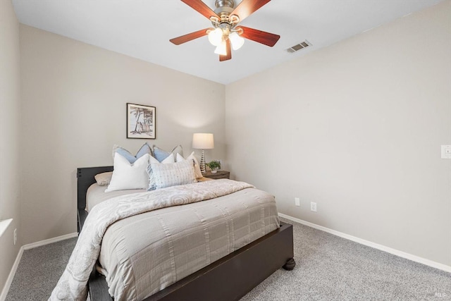 bedroom with visible vents, carpet floors, and baseboards