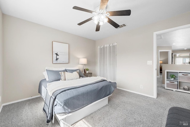 bedroom with visible vents, carpet flooring, and baseboards