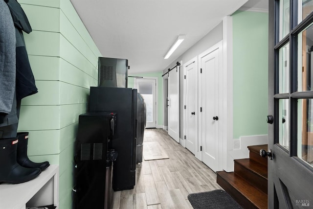 kitchen with light wood-style floors and baseboards