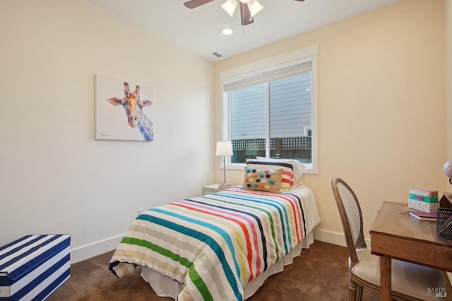 bedroom with carpet flooring, visible vents, baseboards, and ceiling fan