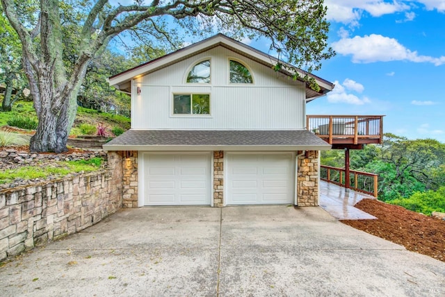 garage featuring driveway