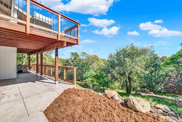 view of patio with a wooden deck