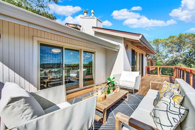 deck featuring an outdoor living space