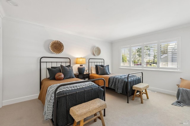 bedroom with baseboards, carpet, and ornamental molding