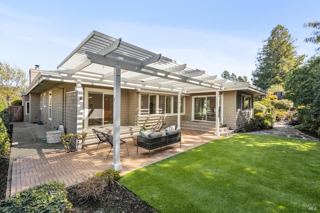 rear view of house featuring a patio, a lawn, outdoor lounge area, and a pergola